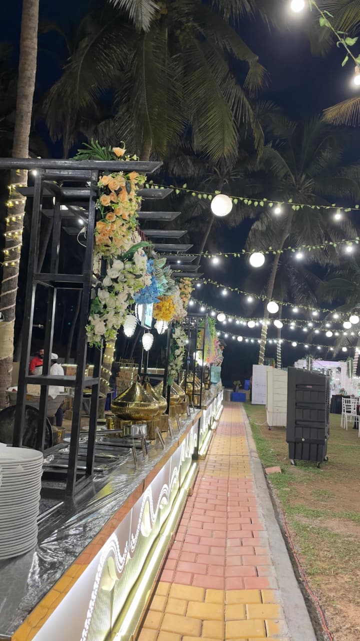 Shanvi Caterers grand outdoor buffet setup with fairy lights in Mangalore